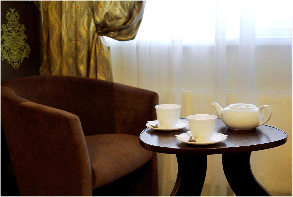 Siesta Hotel Харков Стая снимка